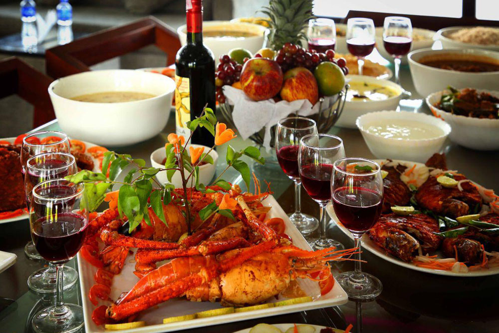 Traditional Kerala cuisine prepared by an experienced chef on a Southern Panorama luxury houseboat in Alleppey.